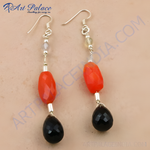 Load image into Gallery viewer, Silver dangle earrings featuring red and black gemstones, perfect for a stylish look.
