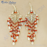 Load image into Gallery viewer, Silver dangle chandelier earrings with red beads and white moonstone gemstones.