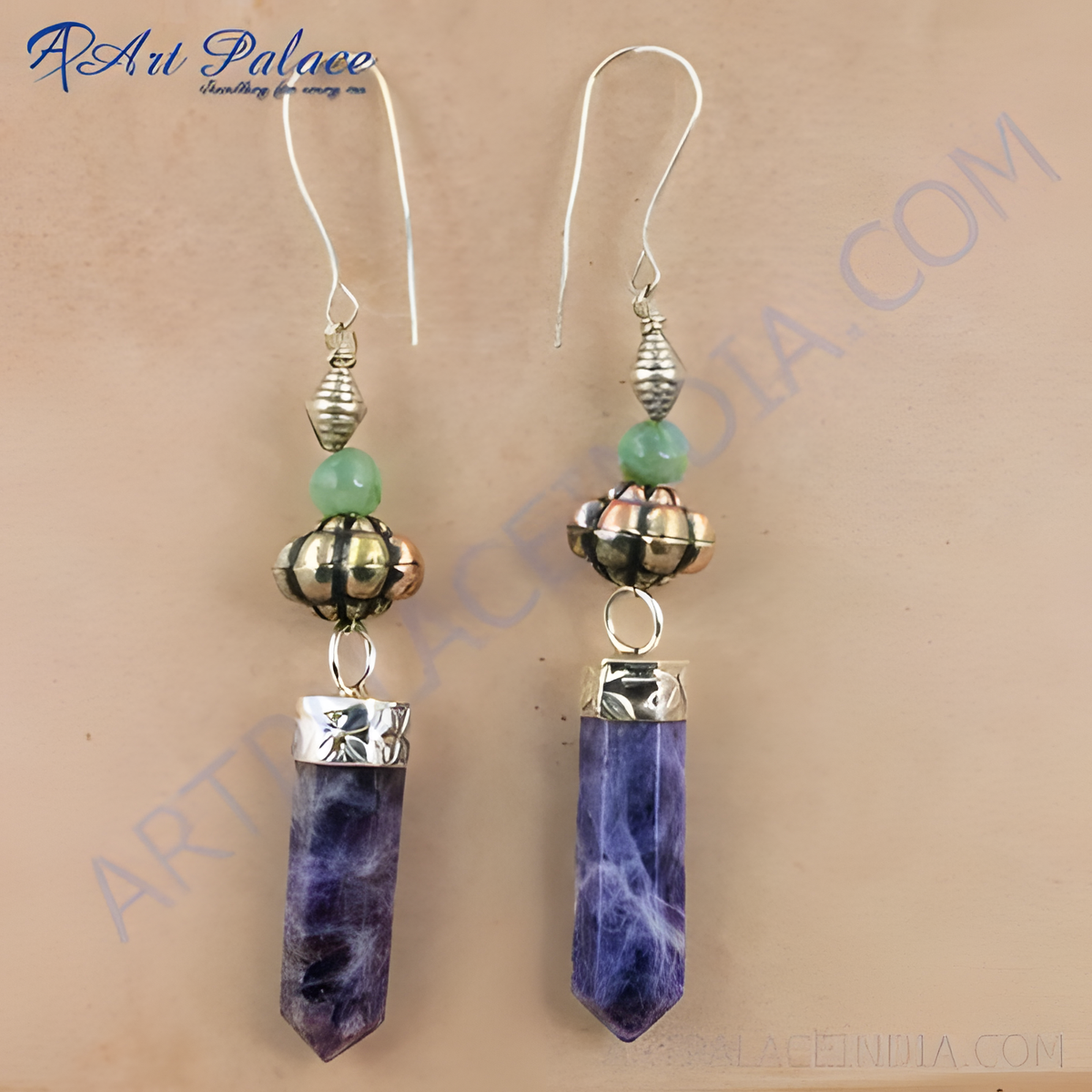 Sterling silver dangle earrings with vibrant purple sodalite gemstones and silver accents