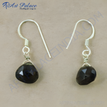 Load image into Gallery viewer, Sterling silver dangle earrings with faceted black onyx teardrop gemstones.