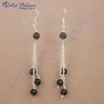 Load image into Gallery viewer, Sterling silver dangle earrings with smoky quartz gemstones, a stylish and elegant accessory.