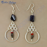 Load image into Gallery viewer, 925 sterling silver dangle earrings with faceted black and purple gemstones and a unique circle design.