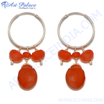 Load image into Gallery viewer, Silver hoop earrings with vibrant orange carnelian gemstone drops, a stunning and fashionable jewelry piece.
