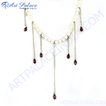 Load image into Gallery viewer, Sterling silver pearl necklace with dangling garnet gemstone drops in a teardrop shape.