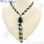 Load image into Gallery viewer, Black onyx beaded Y necklace with teardrop gemstone pendant on a white mannequin
