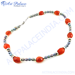 Load image into Gallery viewer, Faceted red carnelian beaded necklace with black freshwater pearls, sterling silver accents, and a silver clasp