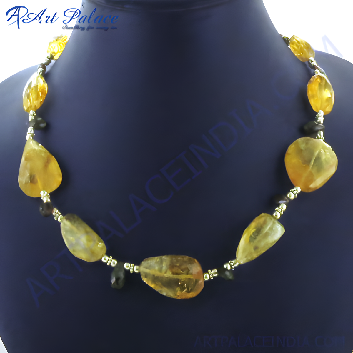 Yellow citrine bead necklace displayed on a dark blue background, gemstone jewelry