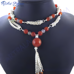 Load image into Gallery viewer, Silver tassel necklace with carnelian gemstone beads, perfect for elegant wear.