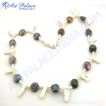 Load image into Gallery viewer, Pearl necklace with iridescent pearls and a silver clasp, perfect for everyday elegance.