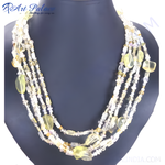 Load image into Gallery viewer, Multi-strand necklace with yellow citrine beads on a dark background
