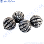 Load image into Gallery viewer, Close-up of four oxidized silver bead charms with gemstone accents on a white background.