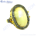 Load image into Gallery viewer, Gold ring with a large oval-shaped yellow gemstone, surrounded by smaller stones.