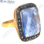 Load image into Gallery viewer, Gold finish ring with a large blue sapphire gemstone and diamond accents, a luxurious cocktail ring for women.