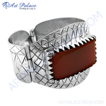 Load image into Gallery viewer, Sterling silver bracelet featuring a rectangular carnelian stone, set in a polished silver frame.