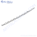 Load image into Gallery viewer, Silver chain bracelet with round and square cut cubic zirconia gemstones on a white background.