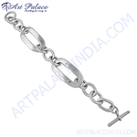 Load image into Gallery viewer, Sterling silver link chain bracelet with a polished finish and toggle clasp, ideal for women's daily wear jewelry.