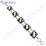 Load image into Gallery viewer, Sterling silver chain bracelet with square links inlaid with gemstones and mother of pearl accents against a white background.