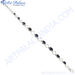 Load image into Gallery viewer, 925 sterling silver chain bracelet with oval-cut violet-blue iolite gemstones