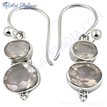 Load image into Gallery viewer, 925 sterling silver dangle earrings with two oval rose quartz gemstones, featuring a hook closure design.