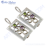 Load image into Gallery viewer, 925 Sterling Silver earrings with amethyst and peridot gemstones and a unique open work design.