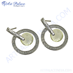 Load image into Gallery viewer, Silver stud earrings with a textured design and a vibrant yellow citrine gemstone center, perfect for women.