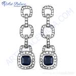 Load image into Gallery viewer, Silver drop earrings featuring sapphire gemstones and sparkling accents, perfect for women's jewelry.