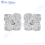 Load image into Gallery viewer, Silver stud earrings with clear cubic zirconia stones in a unique floral design.