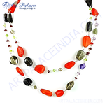 Load image into Gallery viewer, Multi-colored gemstone layered necklace for women. Features red, black, and green stones strung on a delicate chain.