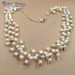 Load image into Gallery viewer, Sterling silver pearl cluster necklace featuring freshwater pearls and a delicate silver chain design.