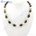 Load image into Gallery viewer, Smoky quartz and pearl bead necklace displayed on a white bust, showing a beautiful jewelry.