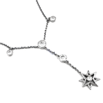 Load image into Gallery viewer, Sterling silver starburst pendant necklace with sparkling cubic zirconia diamonds on a white background.
