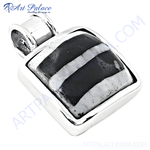 Load image into Gallery viewer, 925 sterling silver zebra jasper pendant, featuring black and white striped gemstone with a polished finish.