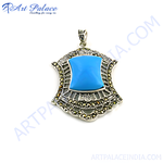 Load image into Gallery viewer, 925 sterling silver pendant with a turquoise gemstone center and marcasite accents.