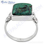 Load image into Gallery viewer, 925 sterling silver ring with a square-cut turquoise gemstone. Features a unique, artistic design.