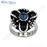 Load image into Gallery viewer, Sterling silver statement ring with a large blue gemstone center stone and unique design