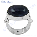 Load image into Gallery viewer, Sterling silver ring featuring a large, oval-shaped blue gemstone. A stylish ring for women.