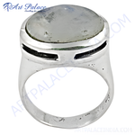 Load image into Gallery viewer, Sterling silver moonstone ring with a large, oval, iridescent moonstone cabochon set in a polished silver band.