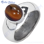 Load image into Gallery viewer, Sterling silver ring with a large oval tiger eye gemstone, warm brown color, men's jewelry