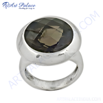 Load image into Gallery viewer, Sterling silver cocktail ring with a large oval-cut smoky quartz gemstone.