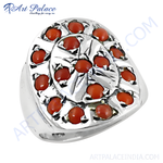 Load image into Gallery viewer, Sterling silver ring with a cluster of bright red coral gemstones in a unique setting.