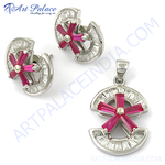 Load image into Gallery viewer, Silver pendant and earring set featuring ruby gemstones and intricate design