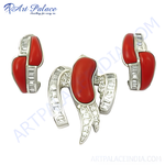 Load image into Gallery viewer, Sterling silver jewelry set with red coral gemstones, including a pendant and matching earrings.