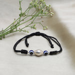 Load image into Gallery viewer, Black Cord Adjustable Bracelet with Silver Bead and Evil Eye Charms
