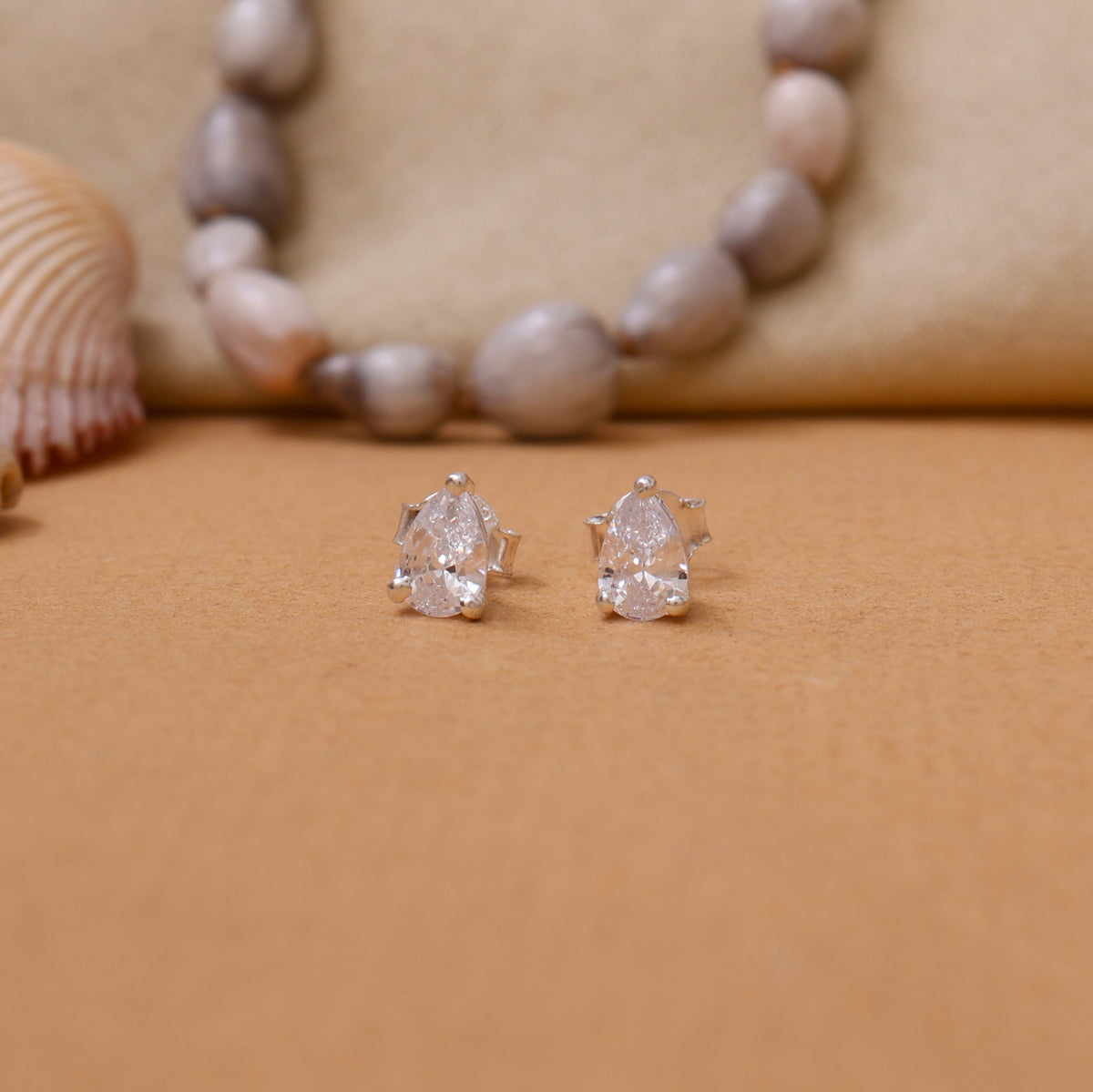 Pear cut diamond stud earrings | silver | for women