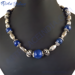 Load image into Gallery viewer, Sterling silver beaded necklace with round blue gemstones and ornate silver beads, perfect for women's fashion jewelry.