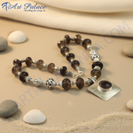 Load image into Gallery viewer, Smoky quartz beaded necklace with silver accents and a large pendant, perfect for women's fashion