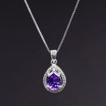 Load image into Gallery viewer, Sterling Silver Pear Amethyst Cubic Zirconia Halo Pendant Necklace