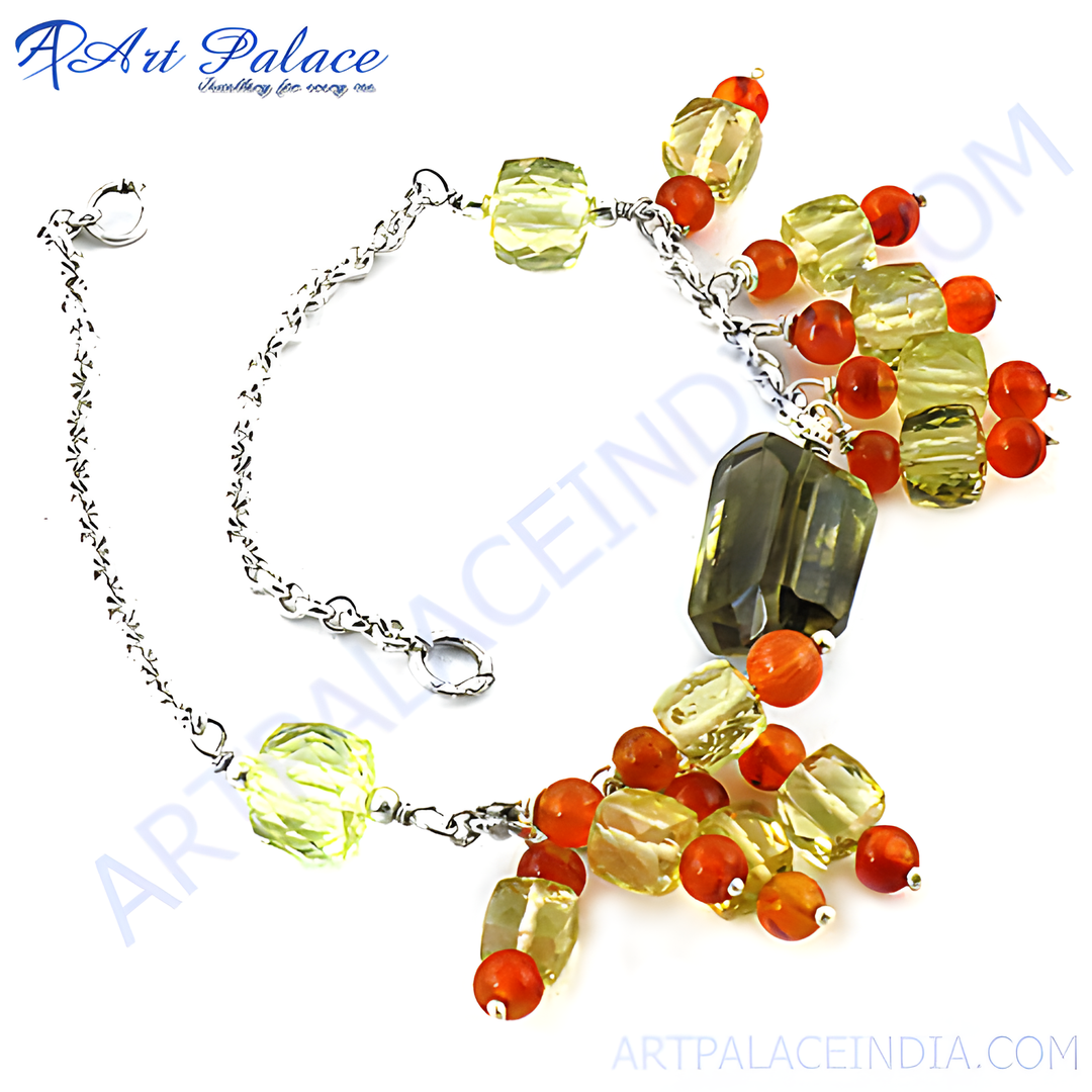 Sterling silver bracelet featuring citrine and carnelian beads. The gemstone bracelet showcases a stunning combination of yellow and orange colors.