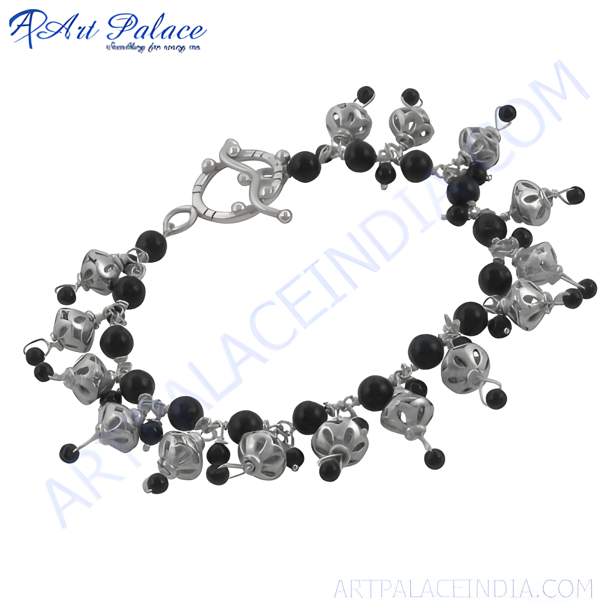 Sterling silver charm bracelet with black onyx beads, a stylish jewelry piece