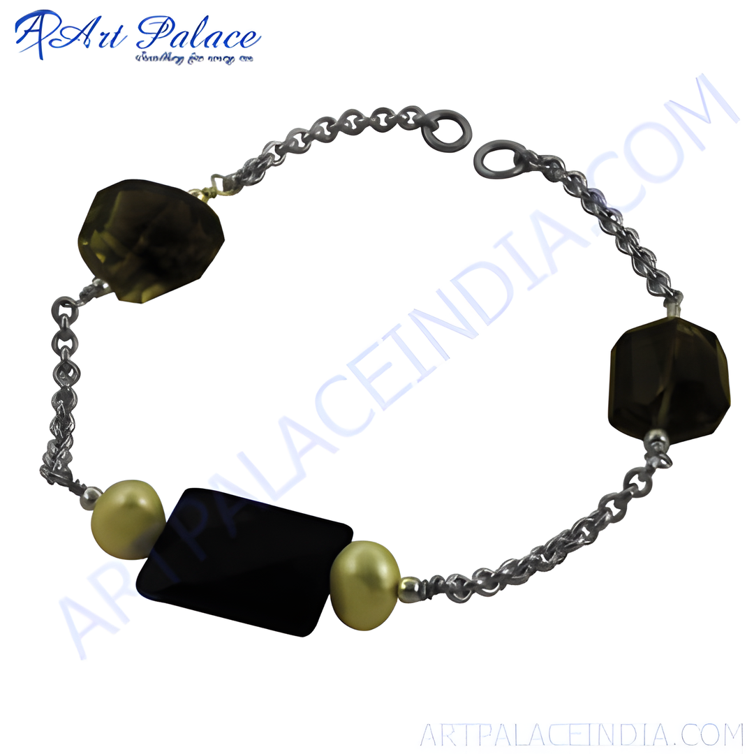 Silver chain bracelet with smoky quartz and gold accents, perfect for daily wear.